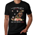 A Woman Cannot Survive On Books Alone She Also Needs Dogs  Versatile T-Shirt